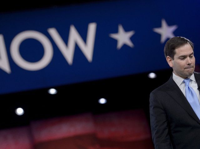 Republican US Presidential hopeful Marco Rubio pauses while speaking during the American C