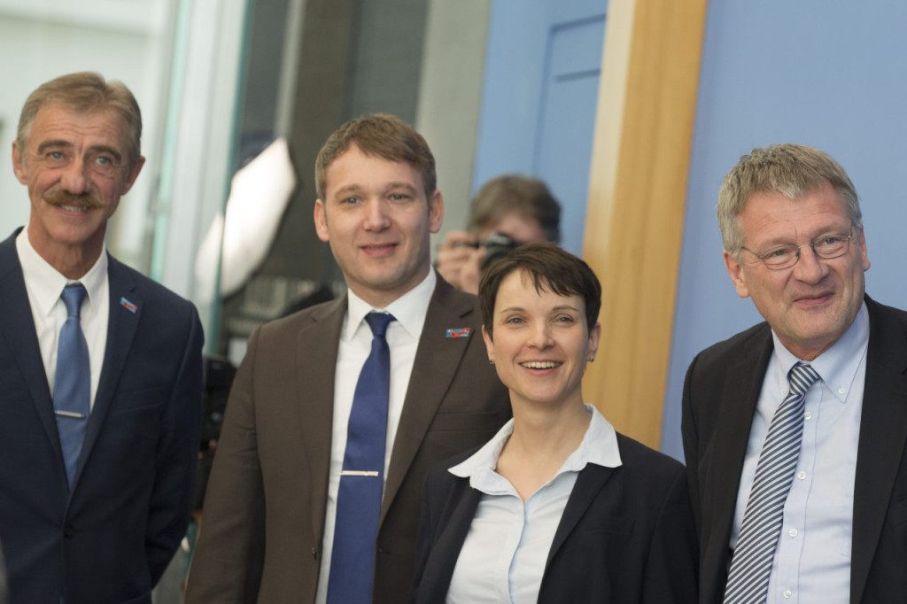 BERLIN, GERMANY - MARCH 14: Frauke Petry, head of the right-leaning populist Alternative fuer Deutschland (Alternative for Germany, AfD) political party, (2nd from right) and Uwe Junge, AfD candidate in Rhineland-Palatinate, Andre Poggenburg, candidate in Saxony-Anhalt and Joerg Meuthen, candidate in Baden-Wuerttemberg, (from left) pose before a news conference following elections in three German states on March 14, 2016 in Berlin, Germany. Voters went to the polls yesterday in Rhineland-Palatinate, Saxony-Anhalt and Baden-Wuerttemberg and the AfD scored double-digit results in all three, dealing a blow to Germany's established parties, especially to the German Christian Democrats (CDU) of Chancellor Angela Merkel. Merkel's liberal immigration policy towards migrants and refugees was a major issue in the elections and the AfD aimed its campaign at Germans who are uneasy with so many newcomers. (Photo by Axel Schmidt/Getty Images)