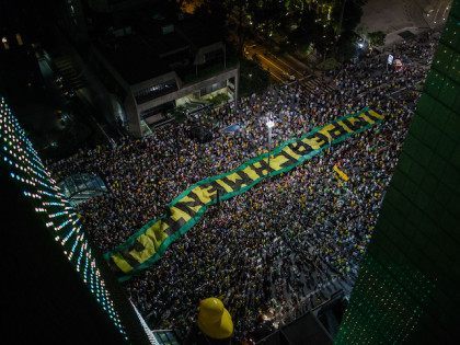 SAO PAULO, BRAZIL - MARCH 16: Demonstrators protest for the impeachment of President Dilma Rousseff and also against corruption being investigated involving resource diversion and money laundering in Petrobras scandal of corruption on March 16, 2016, in Sao Paulo, Brazil. Former President Luiz Inacio Lula da Silva had his temporary …