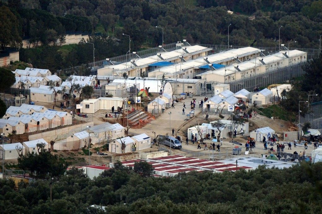A picture shows a view of the Moria camp for migrants and refugees on the Greek island of Lesbos on March 20, 2016. Greece will not be able to start sending refugees back to Turkey from March 20, the government said, as the country struggles to implement a key deal aimed at easing Europe's migrant crisis. / AFP / STR (Photo credit should read STR/AFP/Getty Images)