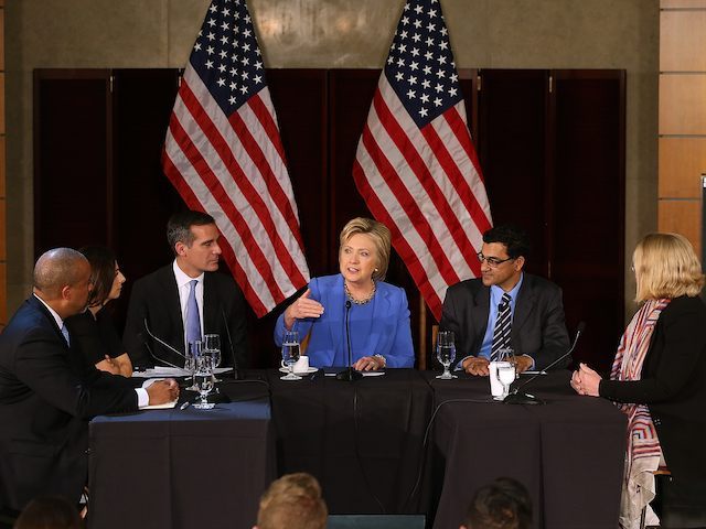 LOS ANGELES, CA - MARCH 24: Democratic presidential candidate former Secretary of State Hillary Clinton (C) speaks during a roundtable discussion at the University of Southern California on March 24, 2016 in Los Angeles, California. In the wake of the terror attacks in Brussels, Hillary Clinton hosted a homeland security …