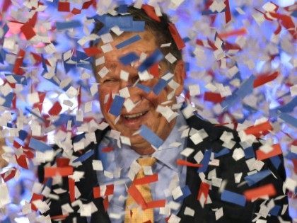 John Kasich confetti (Tony Dejak / Associated Press)