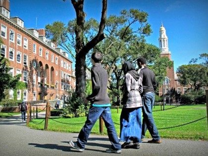 In this Friday, Oct. 7, 2011 photo, people walk on the campus of Brooklyn College in the Brooklyn borough of New York. Investigators have been infiltrating Muslim student groups at Brooklyn College and other schools in the city, monitoring their Internet activity and placing undercover agents in their ranks, police …