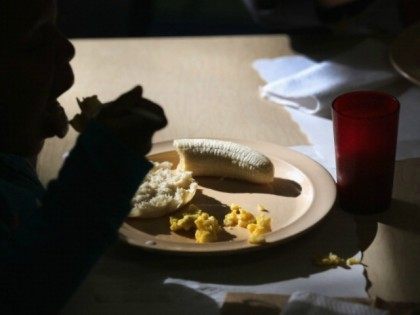 Children eat breakfast at the federally-funded Head Start Program school on September 20,