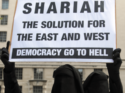 Muslim protestors demonstrate in Whitehall London