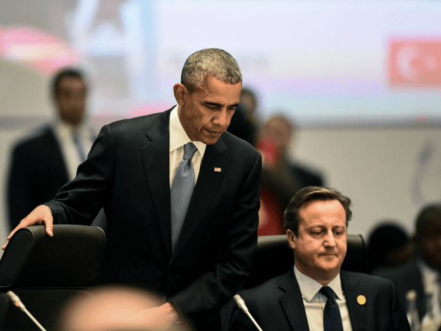 US President Barack Obama and British Prime Minister David Cameron attend a working session on the 