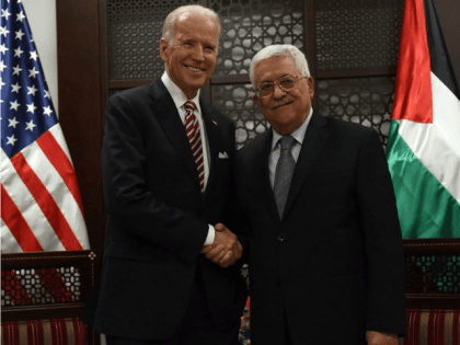 US Vice Presicent Joe Biden (R) and Palestinian president Mahmud Abbas following a meeting at the presidential compound in the city of Ramallah, in the West Bank, on March 9, 2016
