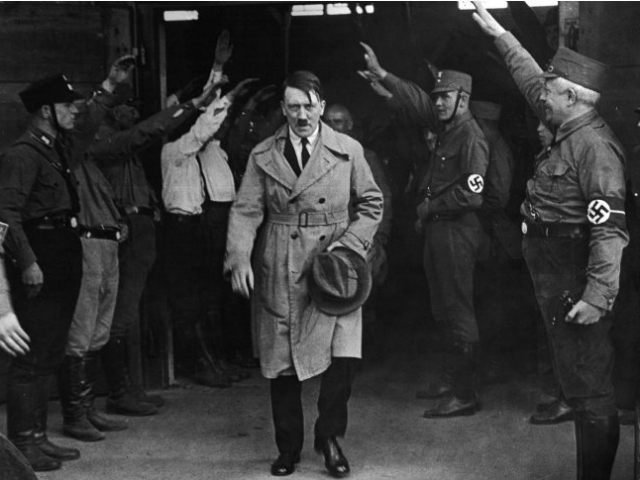 Adolf Hitler, leader of the National Socialists, emerges from the party's Munich headquart