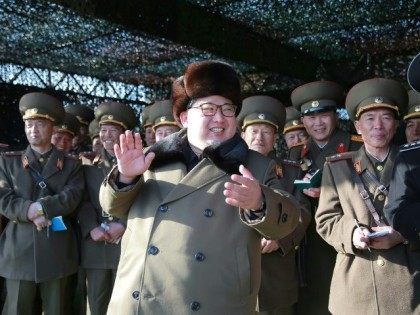North Korean leader Kim Jong-Un (C) attends the KPA tank crew competition