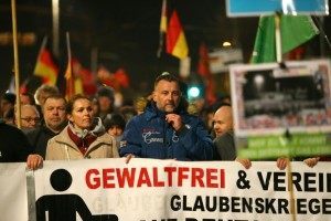 Lutz Bachmann, a leader of the PEGIDA movement (Patriotic Europeans Against the Islamisation of the Occident) speaks to protestors during a rally in Leipzig on March 7, 2016