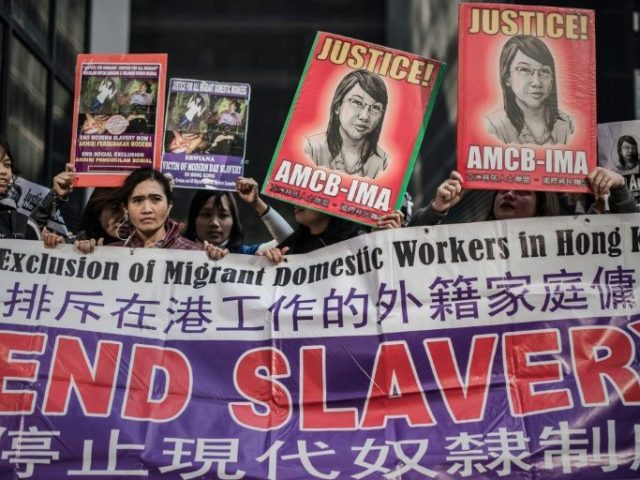 Tens of thousands of foreign maids in Hong Kong are in "forced labour", according to a new