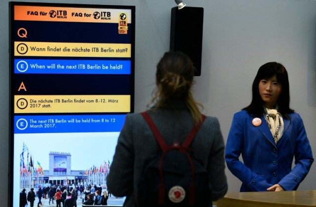 At an entrance to Berlin's exhibition hall where thousands of travel industry professional