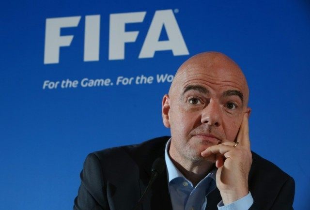 FIIFA president Gianni Infantino addresses a press conference at the St David's Hotel in C