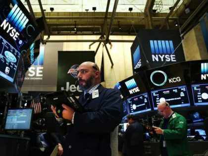 Traders work on the floor of the New York Stock Exchange (NYSE) on March 11, 2016