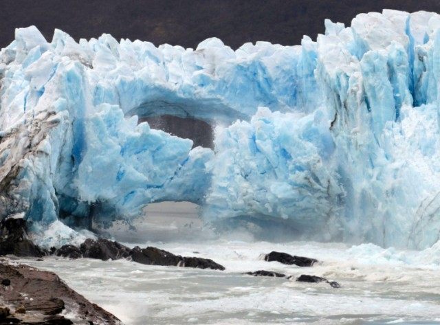 Ice cracks from the wall of the Perito Moreno Glacier located at Los Glaciares National Pa