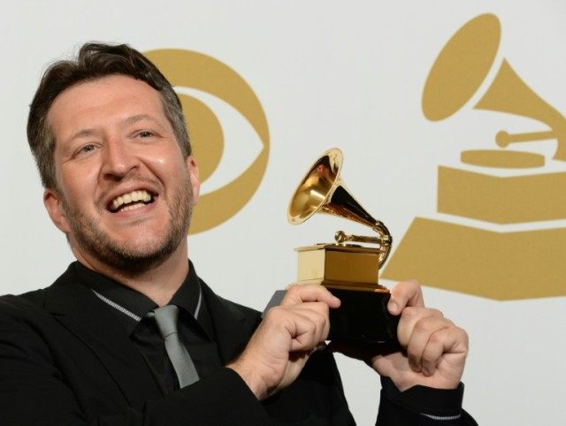 Conductor Thomas Adès poses, pictured with his Grammy on January 26, 2014, is named to a