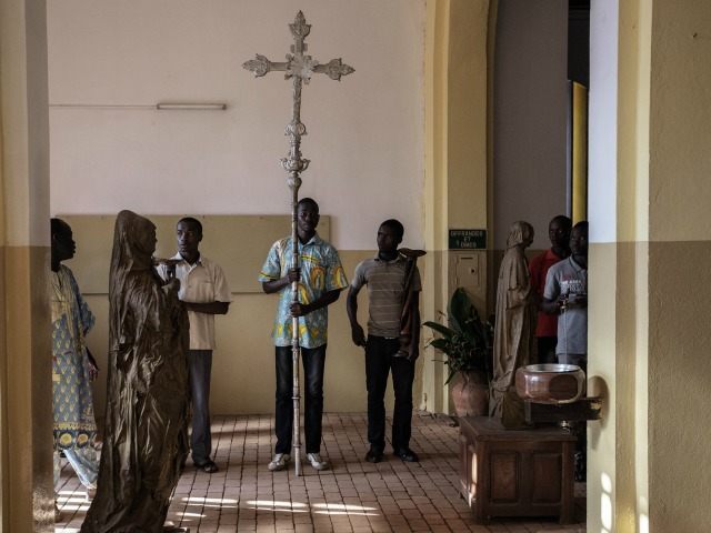 Catholic worshippers rehears proceedings in the capitol main Cathedral Notre Dame during p