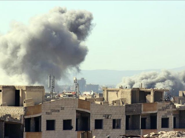 SYRIA, Damascus : DAMASCUS, SYRIA - FEBRUARY 26: Smoke rises after the war crafts belongin