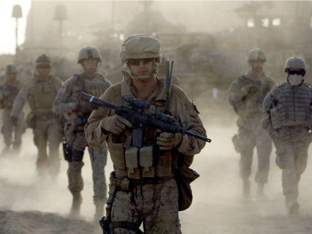 U.S Marines from Delta Company of 2nd Light Armored Reconnaissance Battalion patrol near the town of Khan Neshin in Rig district of Helmand province, southern Afghanistan September 9, 2009. U.S. President Barack Obama faces key decisions in the coming weeks on the war in... REUTERS/GORAN TOMASEVIC
