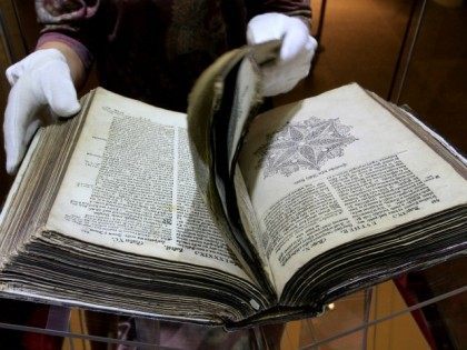 A worker prepares the 400-year-old Kralice's Bible, on September 27, 2013 to be exhib