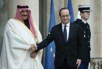 honour French President Francois Hollande (right) greets Saudi Crown Prince Mohammed bin Nayef at the Elysee Palace in Paris, on March 4, 2016