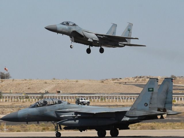 A picture taken on November 16, 2015 shows a Saudi F-15 fighter jet landing at the Khamis
