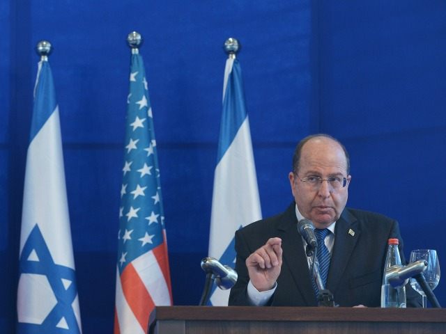 Israeli Defense Minister Moshe Ya'alon speaks during a joint press conference with U.
