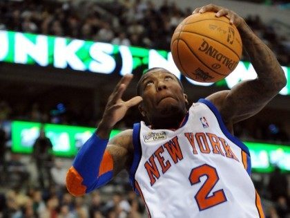 Nate Robinson #2 of the New York Knicks attempts to dunk during the Sprite Slam Dunk Conte