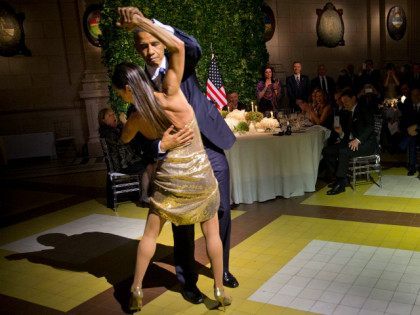 President Barack Obama and first lady Michelle Obama, right, dance the tango with tango da