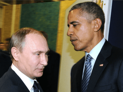 Russian President Vladimir Putin (L) meets with US President Barack Obama on the sidelines of the UN conference on climate change - COP21, on November 30, 2015 at Le Bourget, on the outskirts of the French capital Paris.