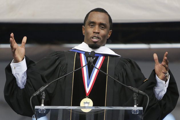 Entertainer Sean Combs delivers the commencement address during the 2014 graduation ceremo