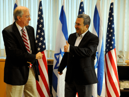 In this handout image provided by the U.S. Embassy Tel Aviv, Dennis Ross, Special Assistant to the President and Director for the Central Region at the National Security Council, with Israeli Minister of Defense Ehud Barak after their meeting, on August 5, 2010 at the MOD in Tel Aviv.