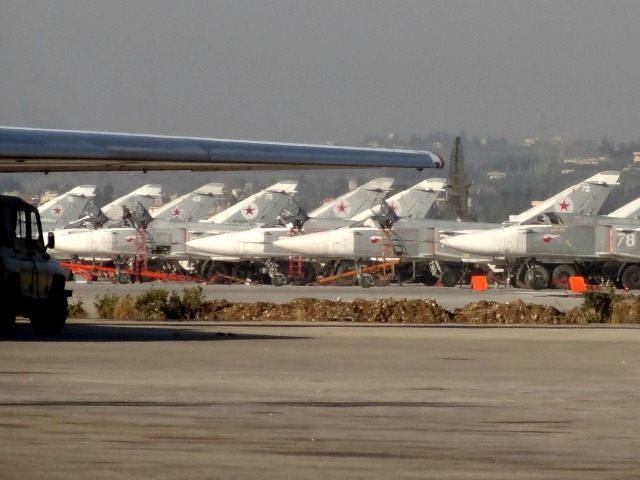 A general view shows Russian fighter jets on the tarmac at the Russian Hmeimim military ba