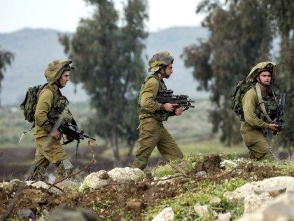 Israeli soldiers from the Golani Brigade take part in a military training exercise in the
