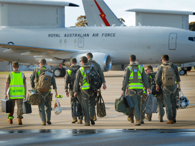 In this handout image provided by Commonwealth of Australia, air crew prepare to board the the E-7A Wedgetail Airborne Early Warning and Control aircraft for deployment to the Middle East on September 21, 2014 in Williamtown, Australia.