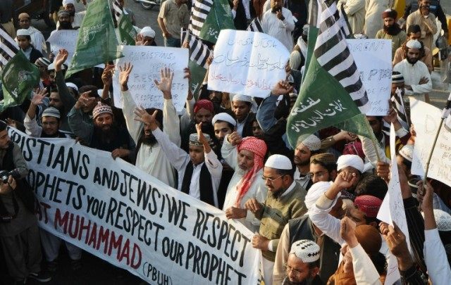 Protesters chant slogans during a rally in Lahore, in November 2010, against Asia Bibi, a