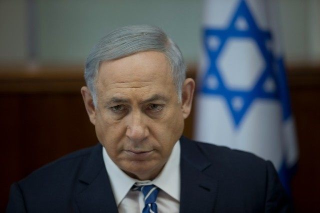 Israeli Prime Minister Benjamin Netanyahu at the weekly cabinet meeting in his Jerusalem o