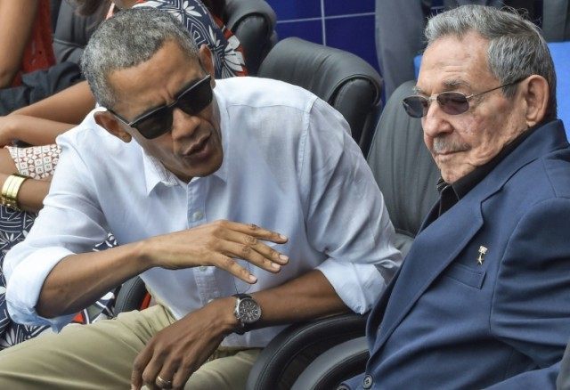 US President Barack Obama speaks next to Cuban President Raul Castro (R) during a Major Le