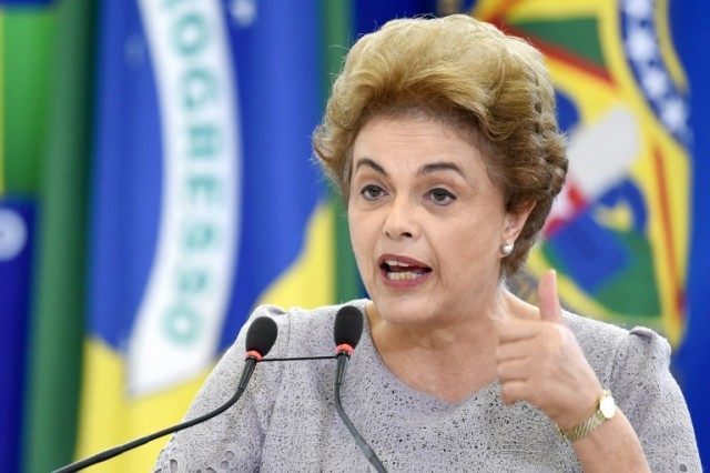 In a defiant speech from the presidential palace, Brazilian President Dilma Rousseff accus