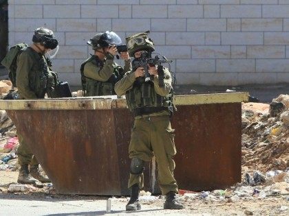 Israeli security forces in the Israeli occupied West Bank city of Hebron