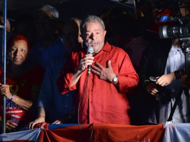 Former Brazilian President Luiz Inacio Lula da Silva participates in a rally of Unionists and members of the Workers Party (PT) to support him, in downtown Sao Paulo, Brazil on March 18, 2016