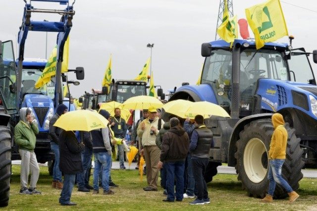 Italian farmers demonstrate during a regional meeting in Bari on March 23, 2016 to protest