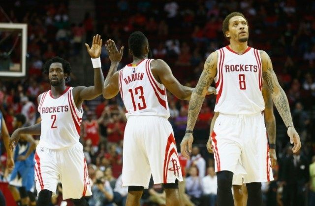 (From L) Patrick Beverley, James Harden and Michael Beasley of the Houston Rockets, seen d