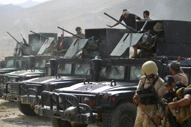 Iraqi security forces and Popular Mobilisation units, pictured in the Makhoul mountains du
