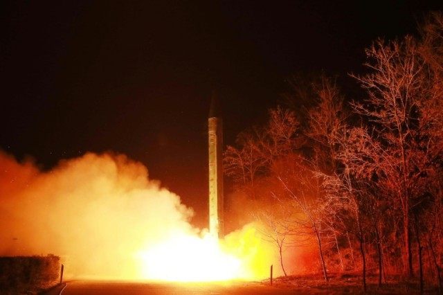 This undated picture released from North Korea's official Korean Central News Agency on March 11, 2016 shows the launch of a ballistic rocket during a mobile drill at an undisclosed location