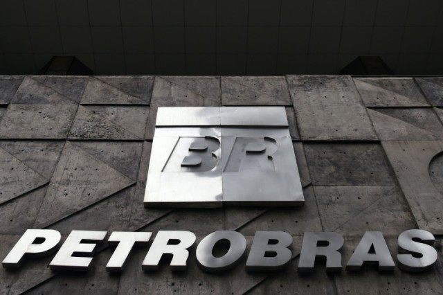 Brazilian state oil company Petrobras reported a record loss of $9.6 billion for 2015, hit