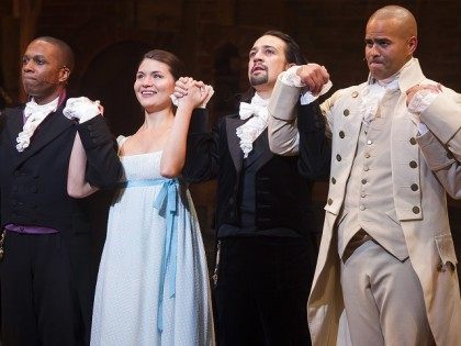 Leslie Odom Jr., from left, Phillipa Soo, Lin-Manuel Miranda and Christopher Jackson appear at the curtain call following the opening night performance of "Hamilton" at the Richard Rodgers Theatre on Thursday, Aug. 6, 2015, in New York. (Photo by Charles Sykes/Invision/AP)
