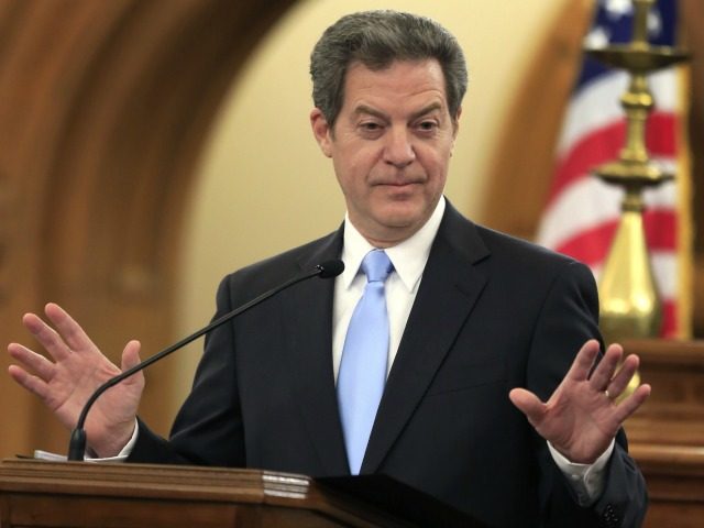 In this Tuesday, Jan. 12, 2016 file photograph, Kansas Gov. Sam Brownback delivers his State of the State address in Topeka, Kan.