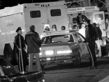 FILE - In this Oct. 21, 1981, file photo, police are at the scene of a Brinks armored truck robbery at the Nanuet Mall in Nanuet, N.Y., where multiple Nyack police officers and a Brinks guard were killed earlier during the robbery. After more than 30 years behind bars Mutulu …