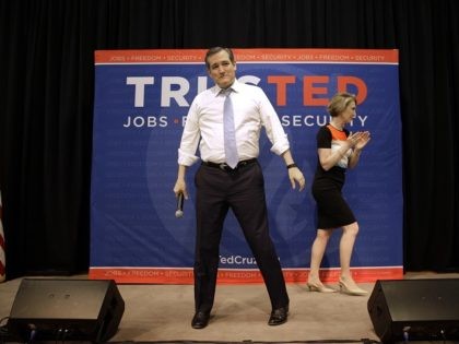 Republican presidential candidate, Sen. Ted Cruz, R-Texas stands onstage after being intro